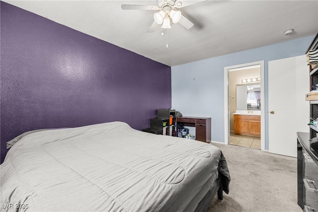 3464 Twilight Star Dr, Las Vegas, NV 89117 - carpeted bedroom with connected bathroom and ceiling fan