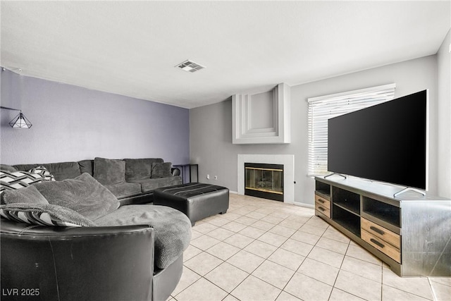 3464 Twilight Star Dr, Las Vegas, NV 89117 - living room with light tile patterned flooring and a glass covered fireplace