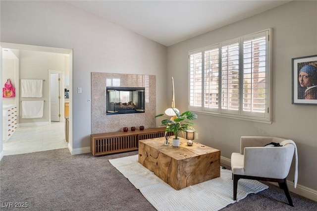 464 Beardsley Cir, Henderson, NV 89052 - living room featuring carpet, a multi sided fireplace, baseboards, and lofted ceiling