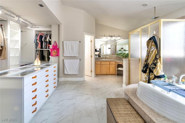 464 Beardsley Cir, Henderson, NV 89052 - full bath with marble look tiles, a stall shower, vanity, vaulted ceiling, and a tub to relax in