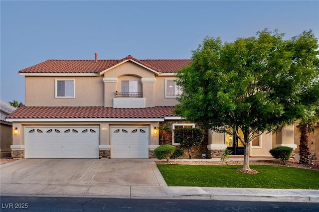 464 Beardsley Cir, Henderson, NV 89052 - view of front of property with an attached garage, stone siding, a tile roof, and concrete driveway