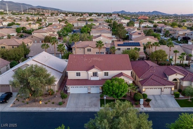 464 Beardsley Cir, Henderson, NV 89052 - aerial view at dusk of a residential view and a mountain view