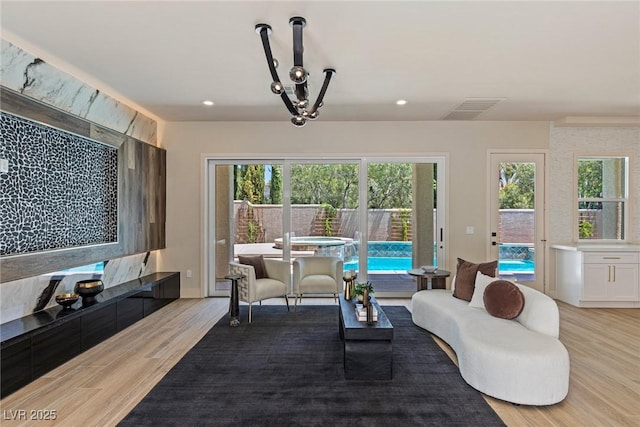 11550 Lampeter Ct, Las Vegas, NV 89138 - living area featuring light wood-style floors and recessed lighting