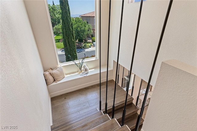 11550 Lampeter Ct, Las Vegas, NV 89138 - stairway featuring wood finished floors and a textured wall