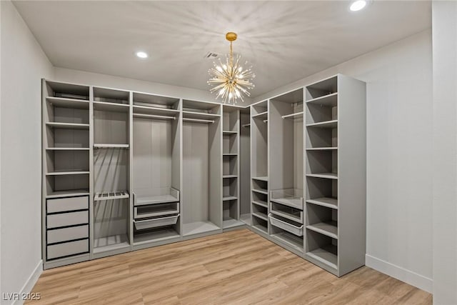 11550 Lampeter Ct, Las Vegas, NV 89138 - spacious closet with wood finished floors and a chandelier