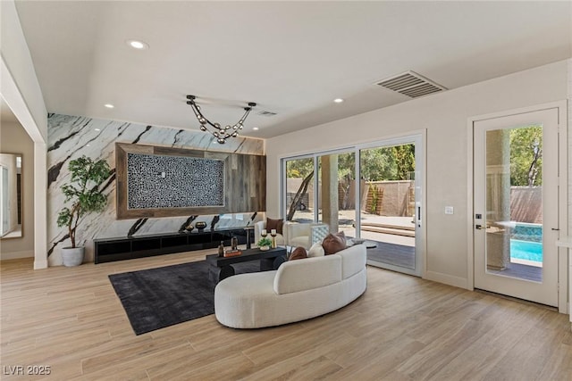 11550 Lampeter Ct, Las Vegas, NV 89138 - living area with recessed lighting, wood finished floors, baseboards, and a chandelier