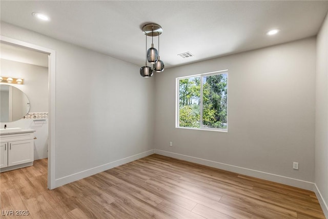 11550 Lampeter Ct, Las Vegas, NV 89138 - unfurnished room with light wood finished floors, baseboards, and recessed lighting