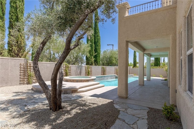 11550 Lampeter Ct, Las Vegas, NV 89138 - view of pool with a patio, a fenced backyard, and a pool with connected hot tub