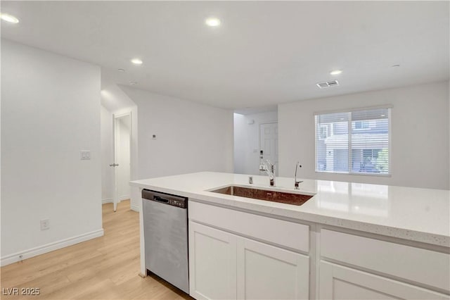 10773 Bede Ct, Las Vegas, NV 89166 - kitchen featuring dishwasher, a sink, recessed lighting, white cabinetry, and light wood-style flooring