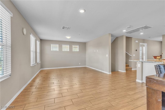 156 Campbelltown Ave, Henderson, NV 89015 - unfurnished room with light wood-type flooring, stairs, baseboards, and recessed lighting