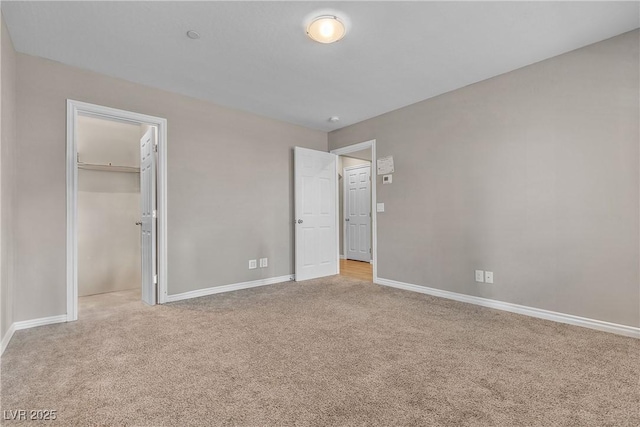156 Campbelltown Ave, Henderson, NV 89015 - unfurnished bedroom featuring carpet, baseboards, and a walk in closet