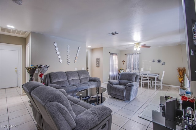 320 Ellen Marie Dr, Las Vegas, NV 89110 - living area with light tile patterned floors and a ceiling fan