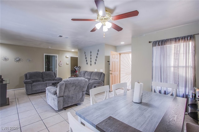 320 Ellen Marie Dr, Las Vegas, NV 89110 - dining area with light tile patterned flooring, ceiling fan, and baseboards