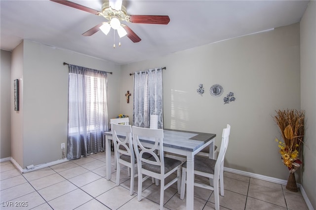 320 Ellen Marie Dr, Las Vegas, NV 89110 - dining area with light tile patterned flooring, ceiling fan, and baseboards