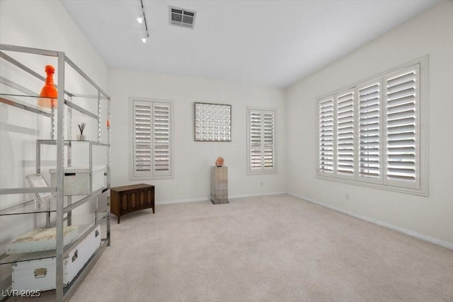 835 Market Crest Dr, Las Vegas, NV 89110 - unfurnished bedroom featuring carpet flooring, rail lighting, and baseboards