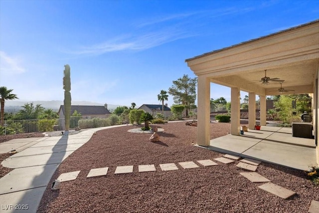 835 Market Crest Dr, Las Vegas, NV 89110 - fenced backyard featuring a ceiling fan and a patio
