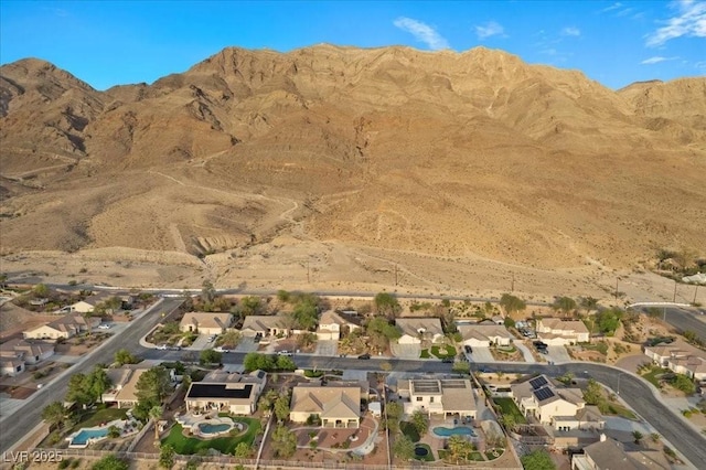 835 Market Crest Dr, Las Vegas, NV 89110 - aerial view of property's location with a mountainous background and nearby suburban area