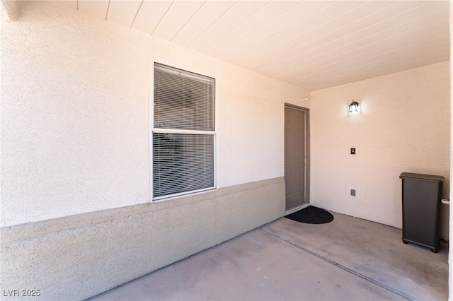 5524 La Pelusa St, North Las Vegas, NV 89031 - doorway to property with stucco siding and a patio