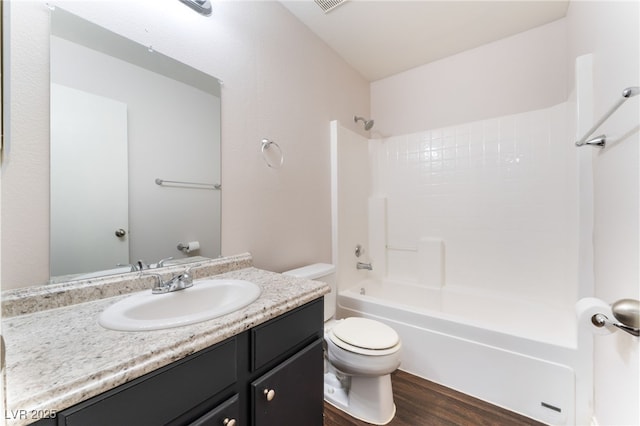5524 La Pelusa St, North Las Vegas, NV 89031 - bathroom featuring toilet, vanity, shower / bath combination, and wood finished floors