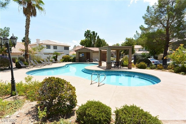 5041 Portraits Pl, Las Vegas, NV 89149 - community pool featuring a patio