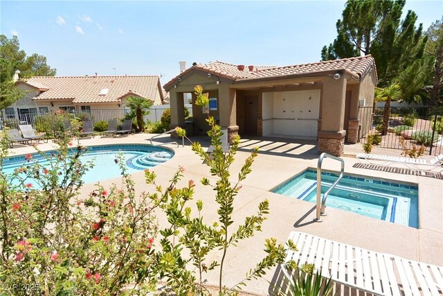 5041 Portraits Pl, Las Vegas, NV 89149 - community pool with a community hot tub and a patio
