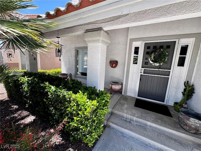 5041 Portraits Pl, Las Vegas, NV 89149 - doorway to property with stucco siding
