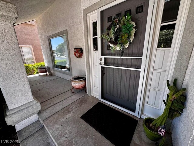 5041 Portraits Pl, Las Vegas, NV 89149 - property entrance featuring stucco siding