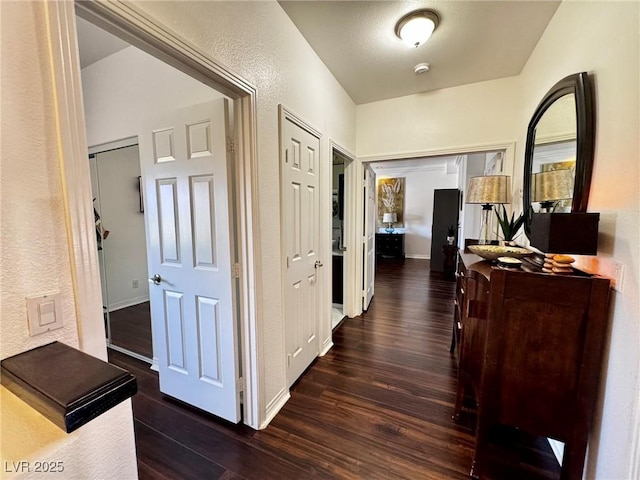 5041 Portraits Pl, Las Vegas, NV 89149 - hallway featuring wood finished floors, baseboards, and a textured wall