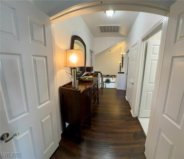 5041 Portraits Pl, Las Vegas, NV 89149 - corridor with arched walkways and wood finished floors