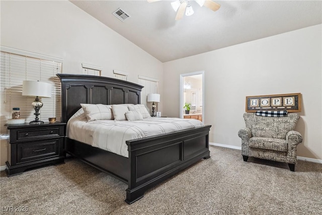 574 Desert Tortoise Way, Mesquite, NV 89027 - bedroom with light carpet, baseboards, ceiling fan, connected bathroom, and high vaulted ceiling