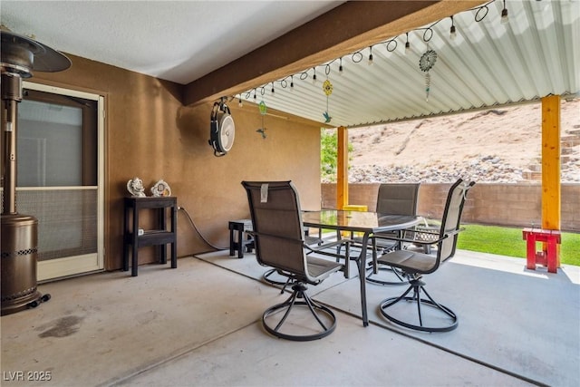 574 Desert Tortoise Way, Mesquite, NV 89027 - fenced backyard with outdoor dining space and a patio area