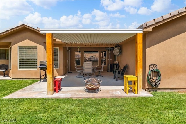 574 Desert Tortoise Way, Mesquite, NV 89027 - view of patio with an outdoor fire pit and a grill