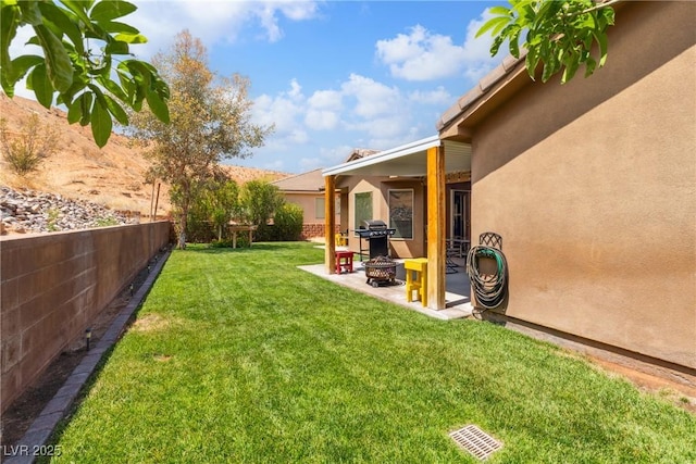 574 Desert Tortoise Way, Mesquite, NV 89027 - view of yard featuring a patio and an outdoor fire pit