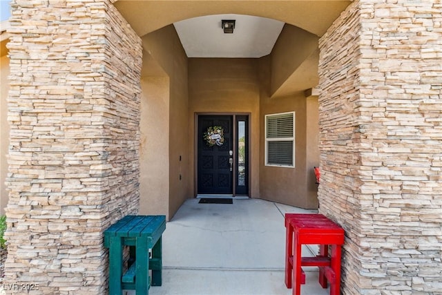 574 Desert Tortoise Way, Mesquite, NV 89027 - property entrance featuring stucco siding and stone siding