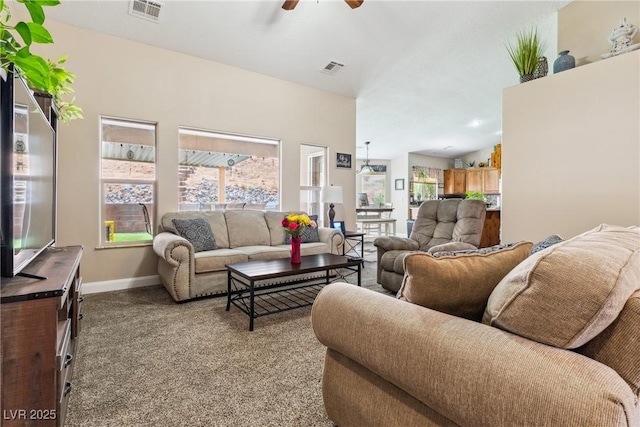 574 Desert Tortoise Way, Mesquite, NV 89027 - carpeted living area with a ceiling fan and baseboards