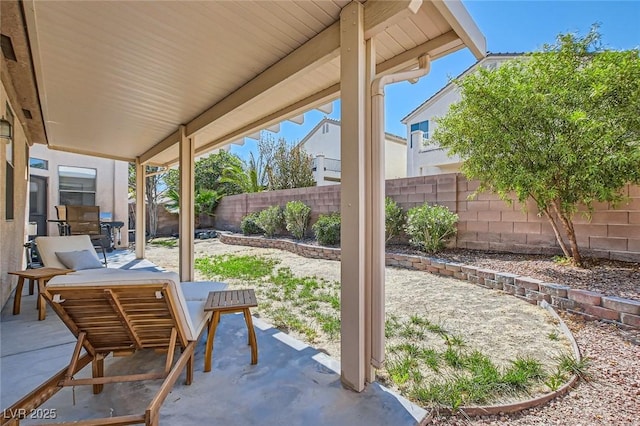 7515 Splashing Rock Dr, Las Vegas, NV 89131 - fenced backyard with a patio area