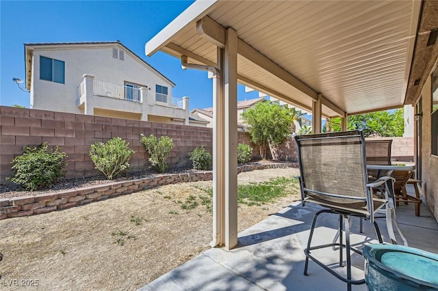 7515 Splashing Rock Dr, Las Vegas, NV 89131 - fenced backyard featuring a patio area and outdoor dining area