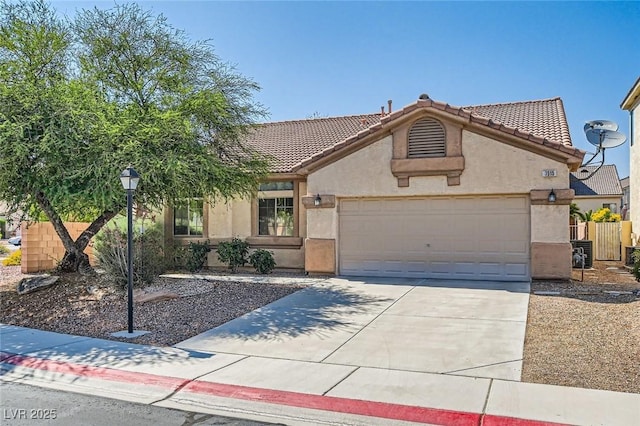 7515 Splashing Rock Dr, Las Vegas, NV 89131 - view of front of home with stucco siding, a garage, concrete driveway, and a tile roof