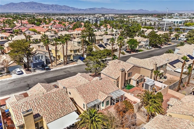 7641 Sea Wind Dr, Las Vegas, NV 89128 - aerial view of residential area featuring a mountainous background