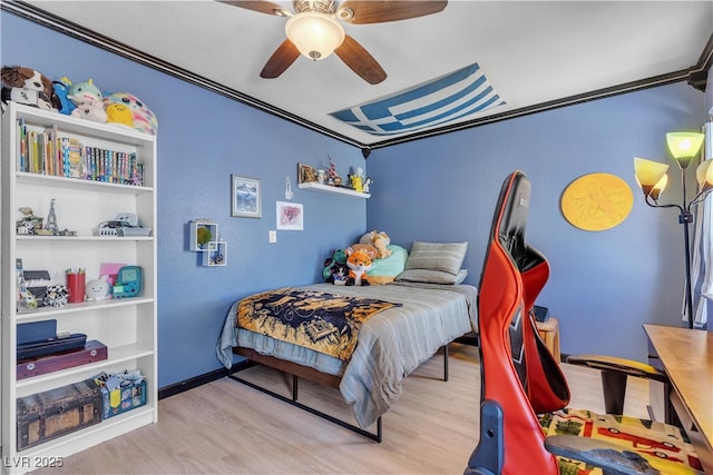 7197 Sixshooter Dr, Las Vegas, NV 89119 - bedroom with wood finished floors, ceiling fan, and baseboards