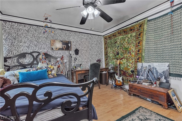 7197 Sixshooter Dr, Las Vegas, NV 89119 - bedroom featuring wallpapered walls, wood finished floors, and a ceiling fan