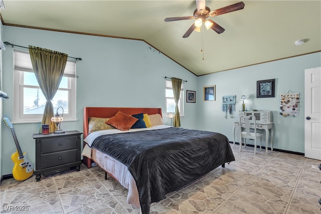 7197 Sixshooter Dr, Las Vegas, NV 89119 - bedroom featuring vaulted ceiling, multiple windows, a ceiling fan, baseboards, and light stone finish floors