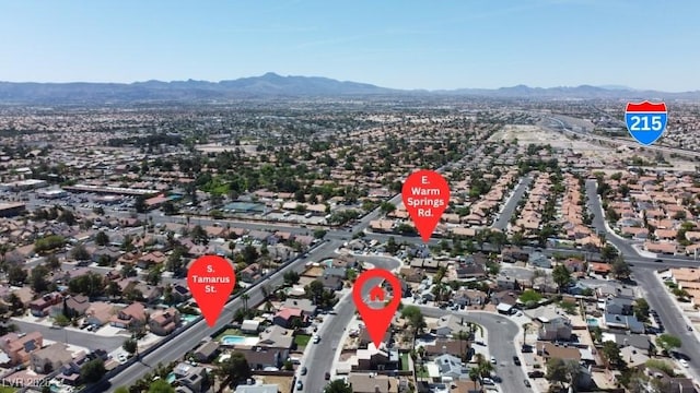 7197 Sixshooter Dr, Las Vegas, NV 89119 - aerial view of property and surrounding area with a mountain backdrop and nearby suburban area
