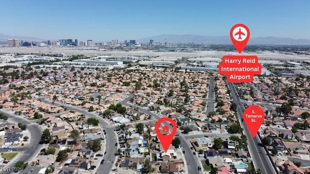 7197 Sixshooter Dr, Las Vegas, NV 89119 - view of property location with a mountainous background and nearby urban area