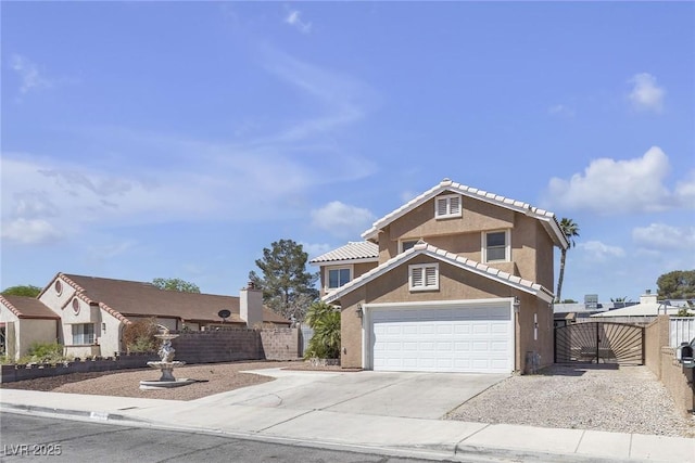 7197 Sixshooter Dr, Las Vegas, NV 89119 - view of front of property with a gate, driveway, and stucco siding