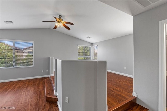 5452 Tinker Toy Ave, Las Vegas, NV 89139 - empty room featuring wood finished floors, lofted ceiling, ceiling fan, and baseboards