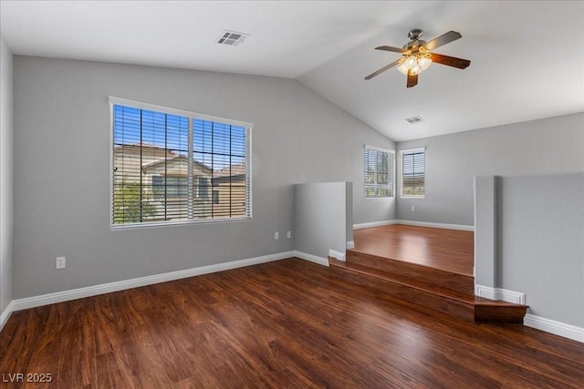 5452 Tinker Toy Ave, Las Vegas, NV 89139 - spare room with wood finished floors, a ceiling fan, vaulted ceiling, and baseboards