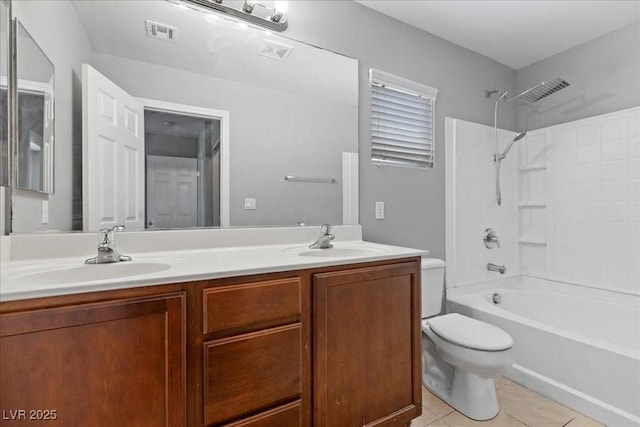 5452 Tinker Toy Ave, Las Vegas, NV 89139 - full bathroom with toilet, double vanity, tile patterned flooring, and  shower combination