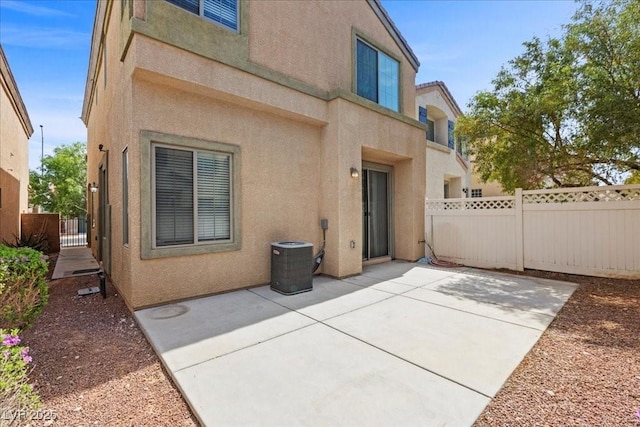 5452 Tinker Toy Ave, Las Vegas, NV 89139 - back of house with stucco siding, a patio, and central air condition unit