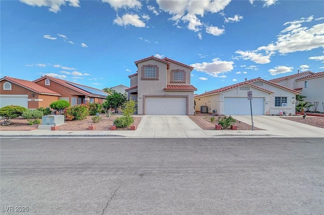 1025 Clover Tip Ct, Las Vegas, NV 89123 - view of front of house with driveway, a garage, a residential view, stucco siding, and cooling unit